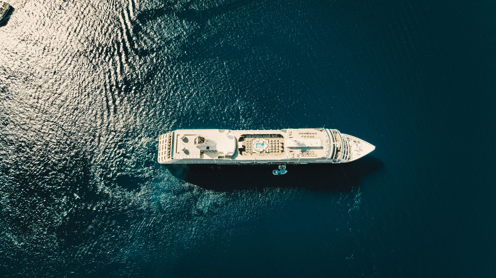 Aerial view of a cruise ship sailing the open ocean