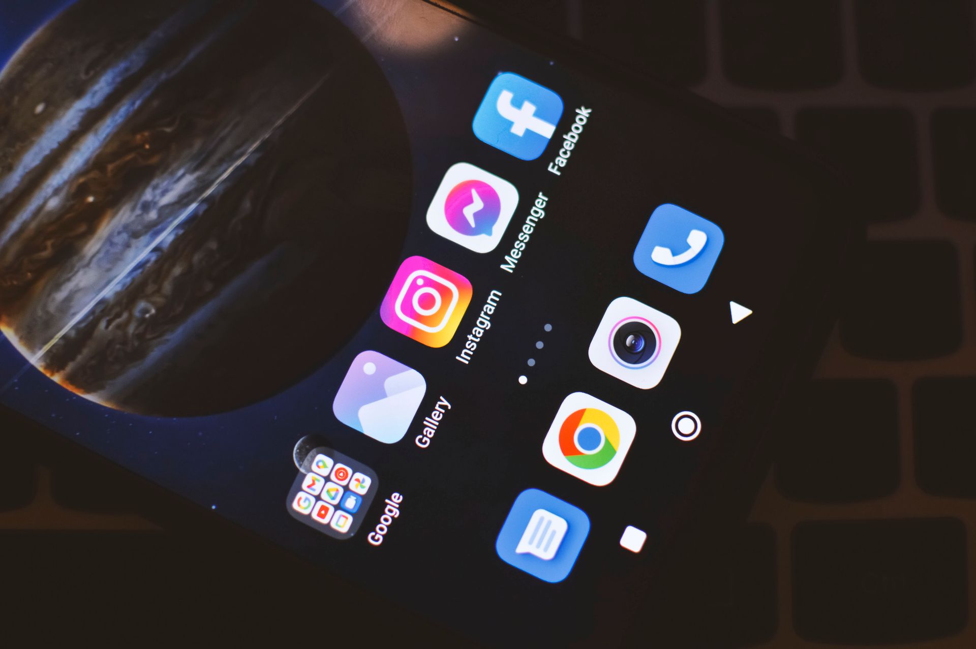 Social media app icons on a smartphone screen