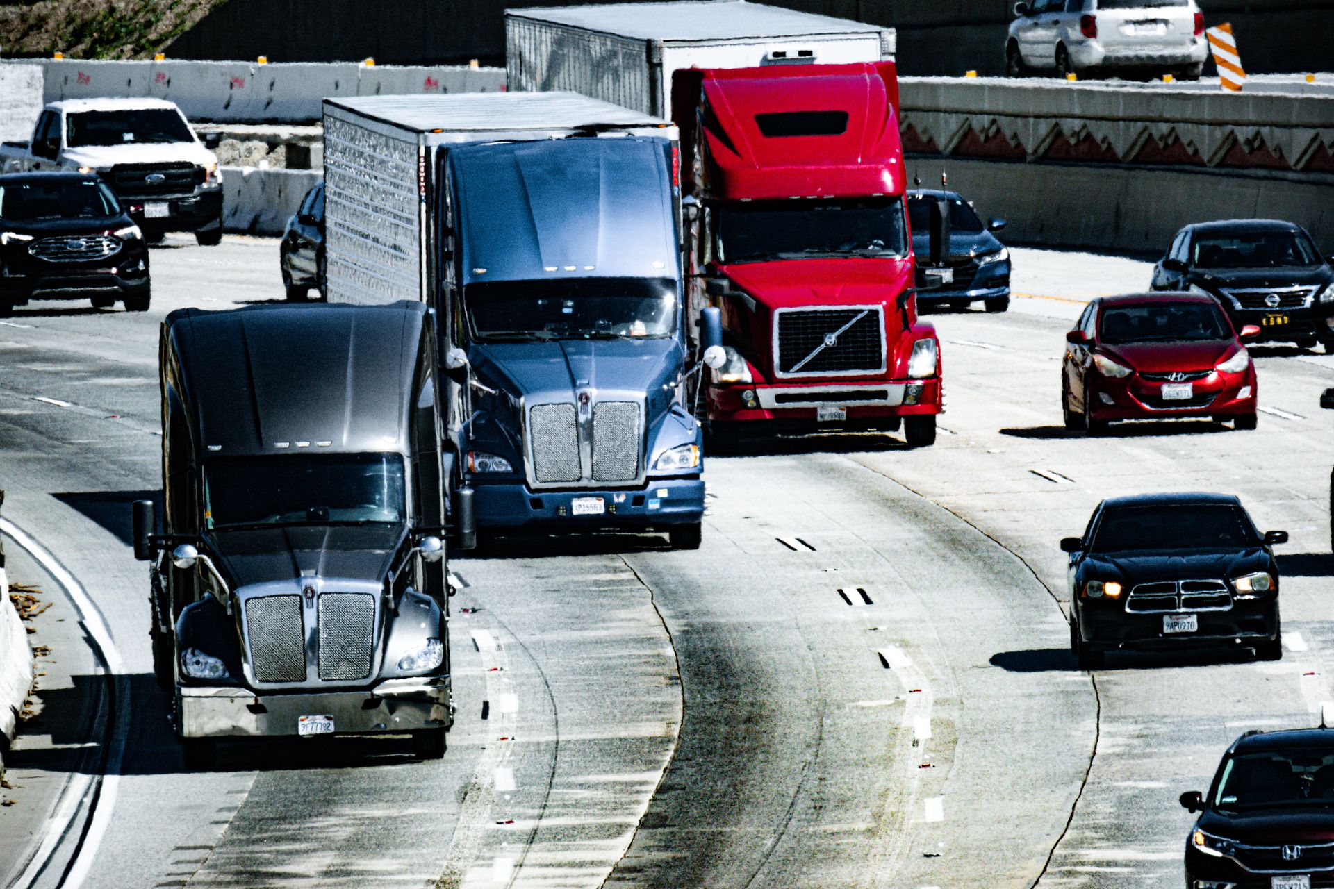 Trucks traveling on a busy highway